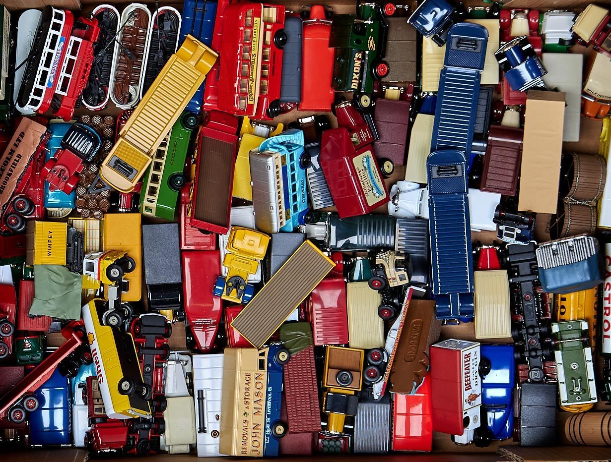 A quantity of Lledo die cast vehicles, mainly days gone, buses, commercial vans, lorries, etc (85