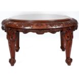 A Chippendale revival carved round walnut jardiniere or fish tank stand, early 20th c, on four