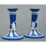 A pair of William Adams & Sons dark blue jasper dip candlesticks, early 20th c, sprigged with
