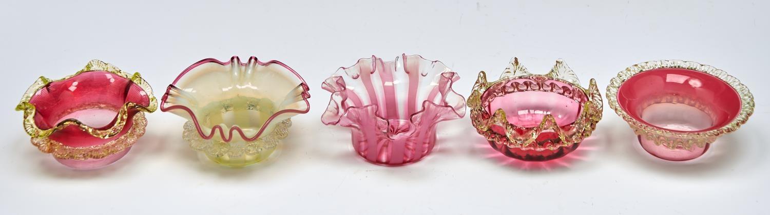 Five cranberry tinted and semi opalescent glass jam dishes, c1900, 12cm diam and circa None damaged