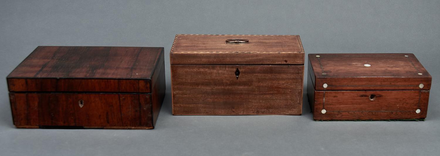A Regency mahogany tea chest, c1810, the lid with ribbon inlaid border, the interior divided into