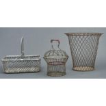 A French wire waste paper basket, a bottle basket and an egg basket, early 20th c and later, waste