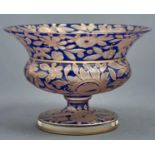 A Bohemian blue enamelled and gilt glass vase of campana form, c1930, decorated overall with