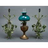 A Continental Famos brass oil lamp,  with green cased white shade and chimney, 56cm h  overall and a