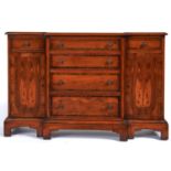 A reproduction yew veneered breakfront dwarf sideboard, late 20th c, outlined throughout with