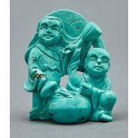 A Chinese carved turquoise group of boys, 20th c, 60mm h Good condition