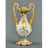 A Staffordshire bone china vase, c1840, of baluster form with entwined handles and pierced rim,