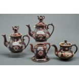 Three Bargeware teapots and covers, one other and a teapot stand, late 19th c, typically sprigged