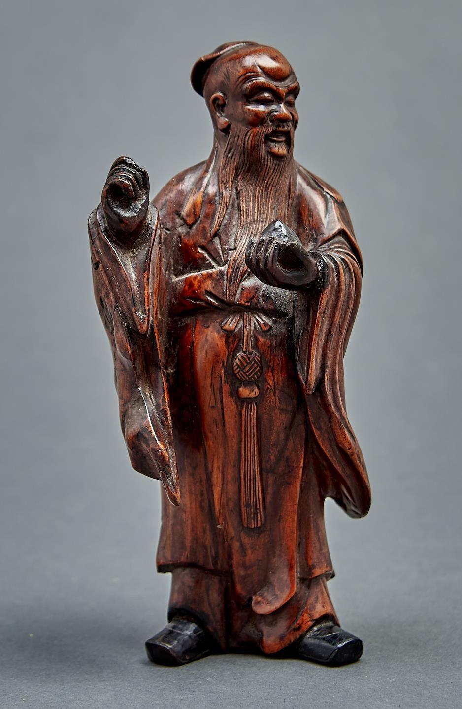 A Chinese carved wood figure of Shou-Lao, 19th / 20th c, 17.5cm h Dusty / dirty, lacking the whisk