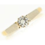 A diamond solitaire ring, the round brilliant cut diamond of approximately 0.20ct, gold hoop