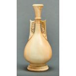 A Royal Worcester vase, 1889, of Persian inspiration with pierced rim and handles and decorated in