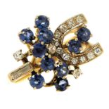 A sapphire and diamond cocktail ring in 14ct gold, import marked, London, no date letter, 6.9g, size