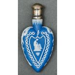 A heart shaped jasper scent bottle, late 19th c, sprigged with classical subjects and foliage,