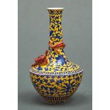 A Chinese yellow ground dragon vase, Qianlong mark, 20th c, enamelled in blue with lotus meander,