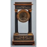 A French gilt bronze mounted, ebonised and inlaid portico clock, c1840, the brass dial with