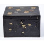 A Japanese lacquer box, Meiji period, of rounded rectangular form, the hinged lid decorated with