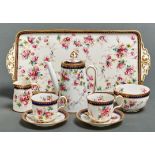 A Copeland bone china cabaret set, c1910, decorated with roses in cobalt and gilt border and a