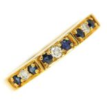 A nine stone sapphire and diamond ring in 18ct gold, London 1978, 3.3g, size Q