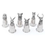 Hunting interest. A set of six EPNS stirrup cups in the form of the head of a fox, horse, hound,