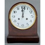 A German mahogany and line inlaid mantel clock, c1920, in arched case with enamel dial and gong