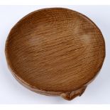 Robert 'Mouseman' Thompson of Kilburn - an adzed oak circular shallow bowl on foot, the side