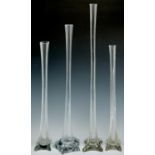 Four similar glass lily vases, 20th c, 49.5 - 70.5cm h Undamaged