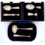 Three children's silver spoons and pushers, various makers and dates, cased, 3ozs 15dwts (3 cases)