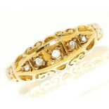 A five stone diamond ring with chip diamonds, in 18ct gold, Birmingham 1912, 2.5g, size M½ Light