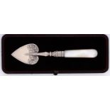 A Victorian mother of pearl hafted heart shaped silver serving slice, by William Devenport,