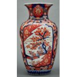 A Japanese Imari baluster vase,  early 20th c,  the body with four shaped panels, two with finches