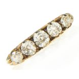 A five stone diamond ring, the cushion shaped old cut diamonds in gold, 2.7g, size P Diamonds