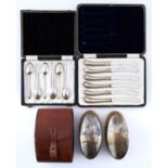 A cased set of silver teaspoons, inscribed O.T.G.S. Sheffield 1946, cased silver hafted butter