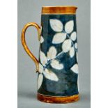 A Doulton ware pate-sur-pate jug, 1879-95, decorated by Harry Barnard with leaves, 22.5cm h,