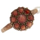 A 9ct gold red stone cluster ring, 2.2g, size O