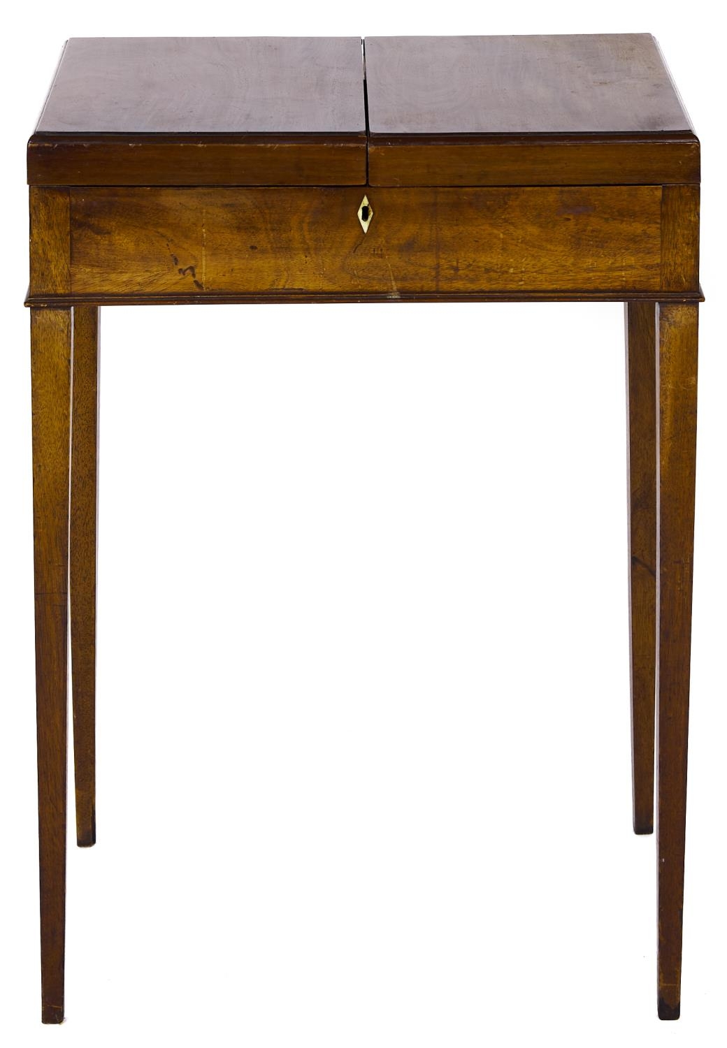 A George III mahogany dressing table, c1800, the top hinged at the sides revealing an interior