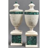 A pair of neo classical style marble and malachite urns, 20th c, in late 18th c style, of shield