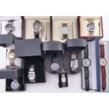 Twelve stainless steel and other fashion watches, all but one boxed / cased Practically as new. Note