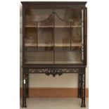 A Victorian mahogany Chippendale revival china cabinet, late 19th c, the front with carved '