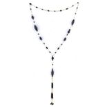 A 1920's necklace of black and white glass beads with large Venetian murrine beads at intervals