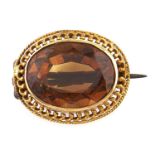 A Victorian gold and citrine brooch, 3g