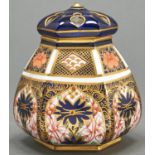 A Royal Crown Derby hexagonal Imari pattern pot pourri jar and cover, 1920, 12cm h, printed mark