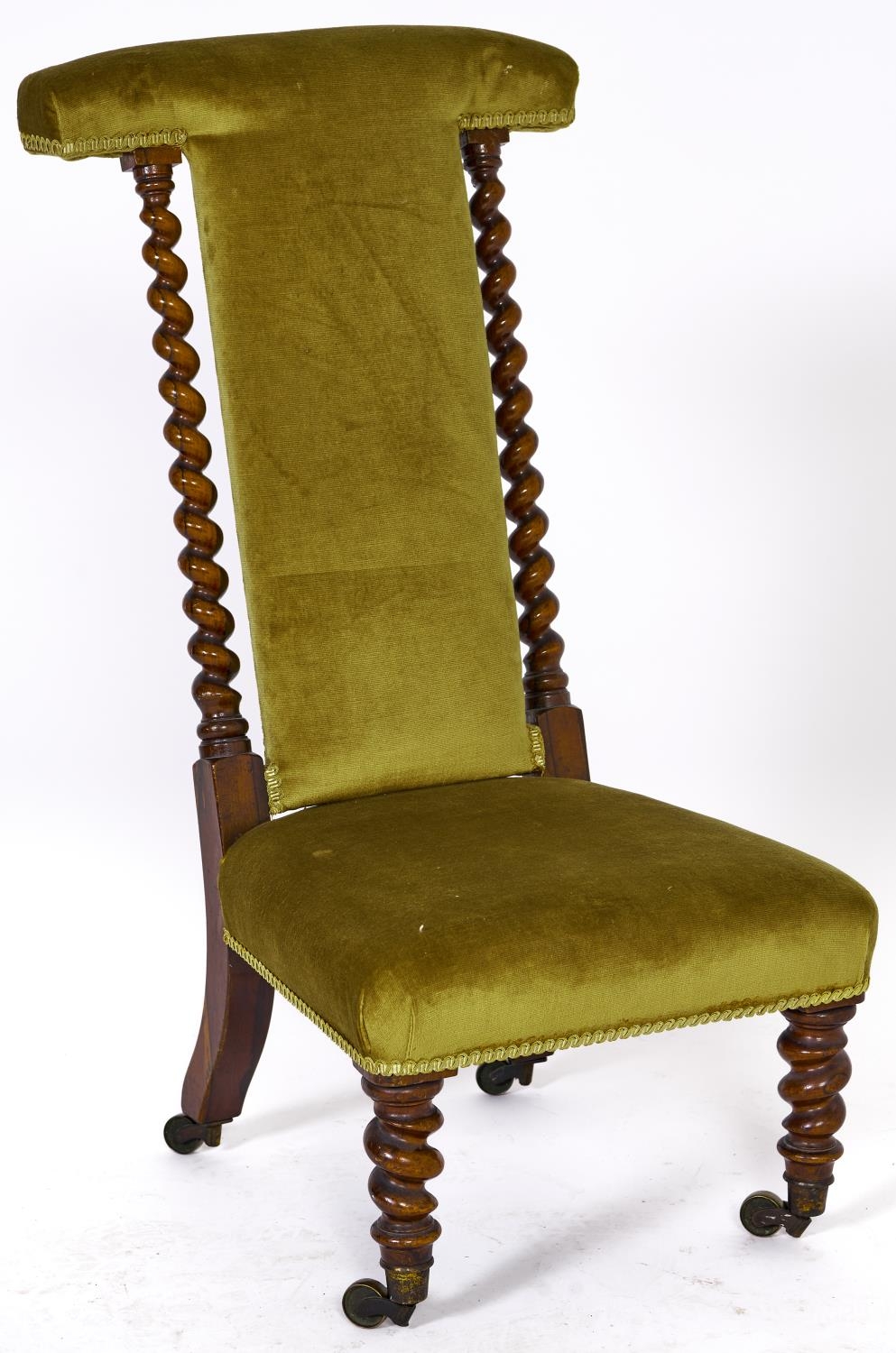 A Victorian rosewood Prie Dieu, c1860, upholstered top, back and stuffed over seat in mustard