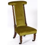 A Victorian rosewood Prie Dieu, c1860, upholstered top, back and stuffed over seat in mustard