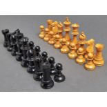 A Staunton style chess set, boxwood and ebonised, weighted, kings 9.5cm h, in a felt lined brown