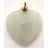 A celadon jade heart shaped pendant, gold loop, 6.5g