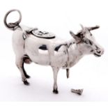 A Continental silver cow creamer, the lid cast with a fly, 7cm h, import marked J G Piddington,