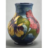 A Moorcroft Hibiscus vase, 1982, 24cm h, impressed and green printed marks and date, painted