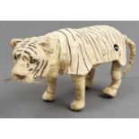 A Roullet & Decamps pouncing tiger automaton, 20th c, with glass eyes, 17cm h approx Movement very