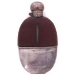 A George V silver mounted glass hip flask, with stitched brown leather covered shoulder and