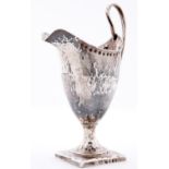 A George III silver cream jug, helmet shaped, 14.5cm h, maker's mark overstruck by another's,